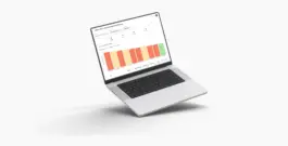 An image of a Macbook computer displaying a bar graph. The graph compares the emissions data of different buildings, categorized as high, medium, and low impact. This data can help building managers focus their decarbonization efforts on the buildings that will have the greatest impact. 